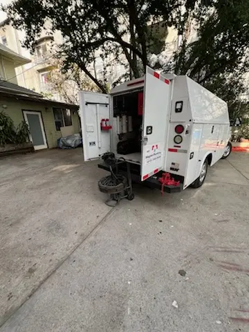 Magnet Plumbing service vehicle on-site for Grease Trap Cleaning in Mount Parnassus